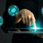 A person interacts with a digital tablet, surrounded by glowing holographic icons representing data analytics, global connectivity, and financial growth.